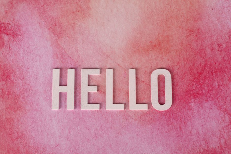 苏梅 — Pink textured background with bold white 'HELLO' text for greetings and communication.