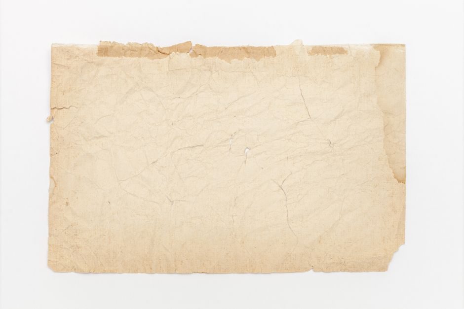 玉色 — High-resolution image of a vintage tattered paper, ideal for backgrounds and design projects.